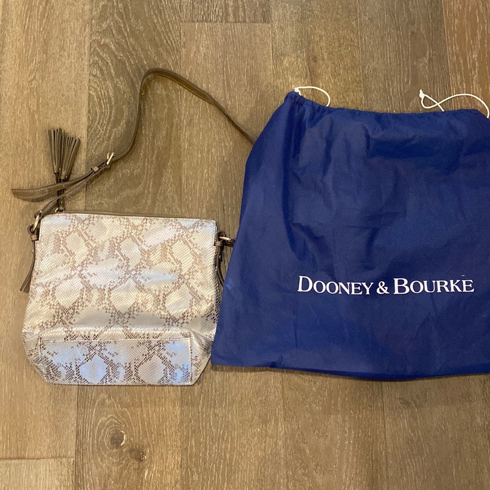 Dooney and Bourke snakeskin pattern purse.  Good condition